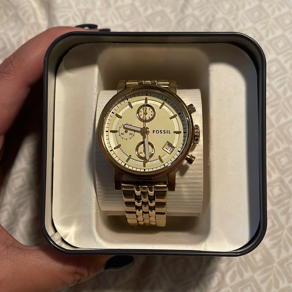 Fossil gold watch.